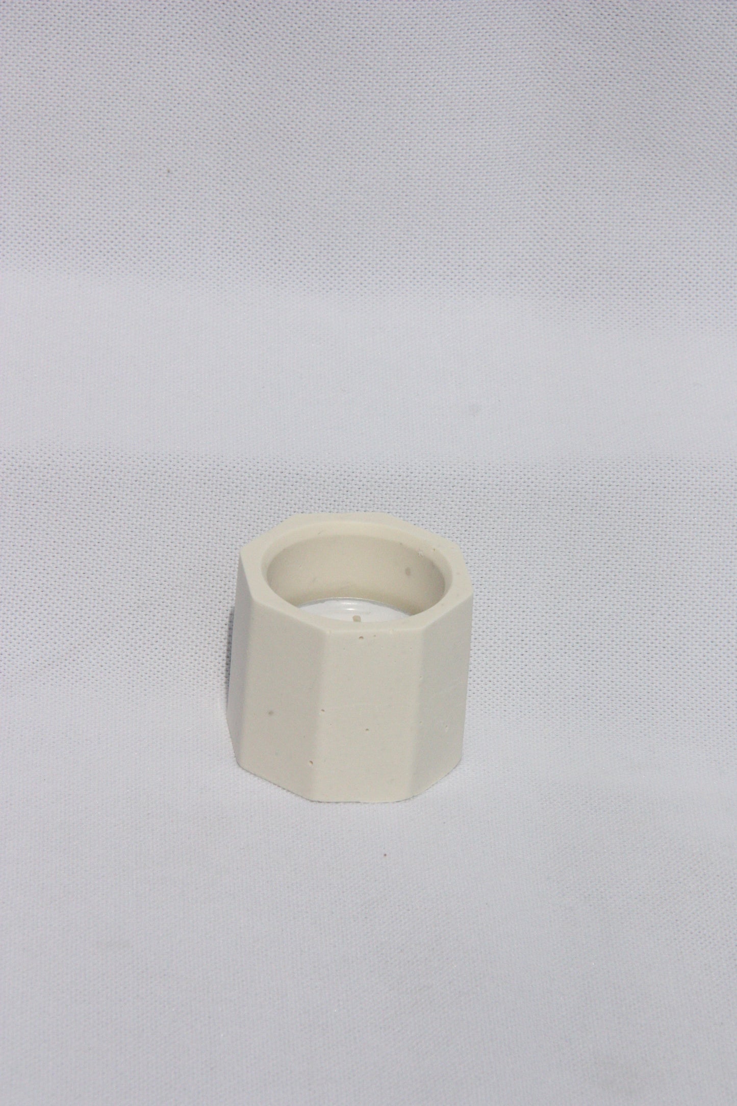 Waxine candle holder